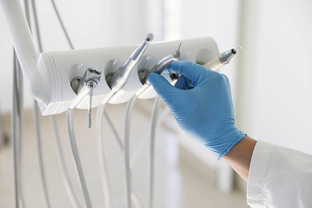 Professional Emergency Dentist technician working in Mentone, IN